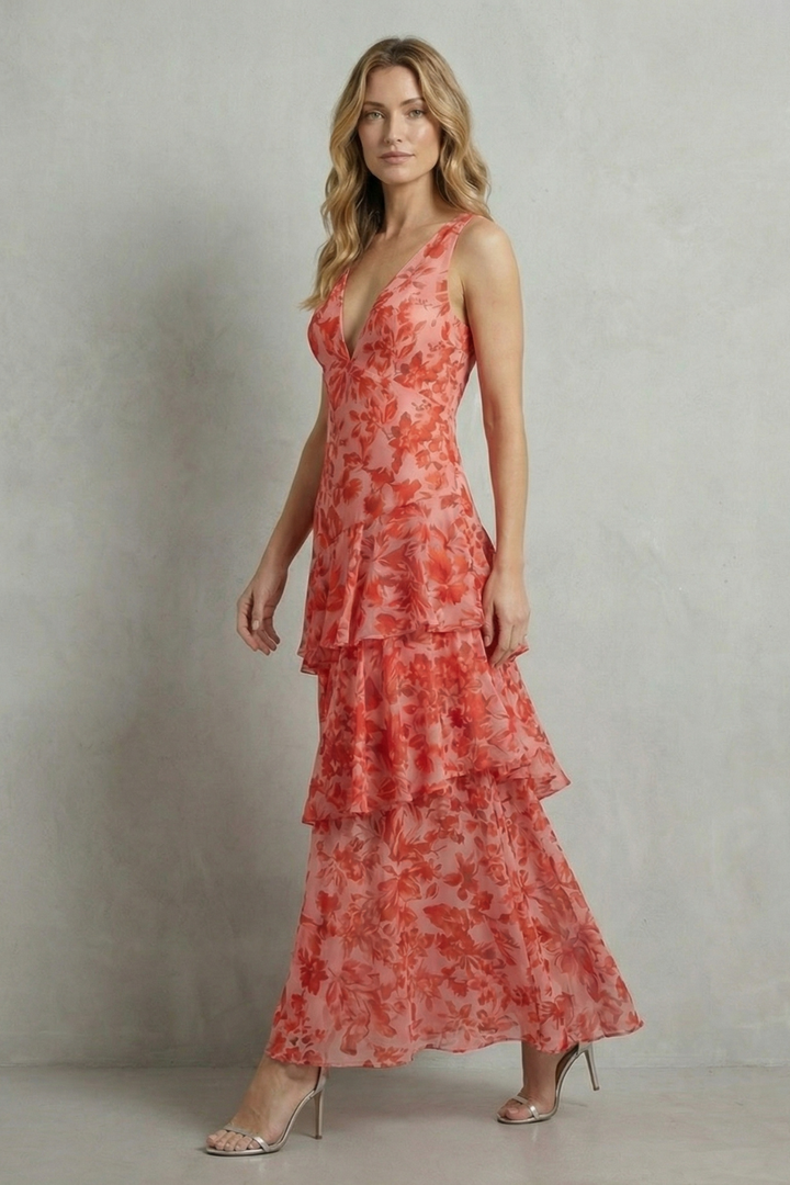 Red-orange chiffon maxi dress with V-neck and tiered ruffle hem