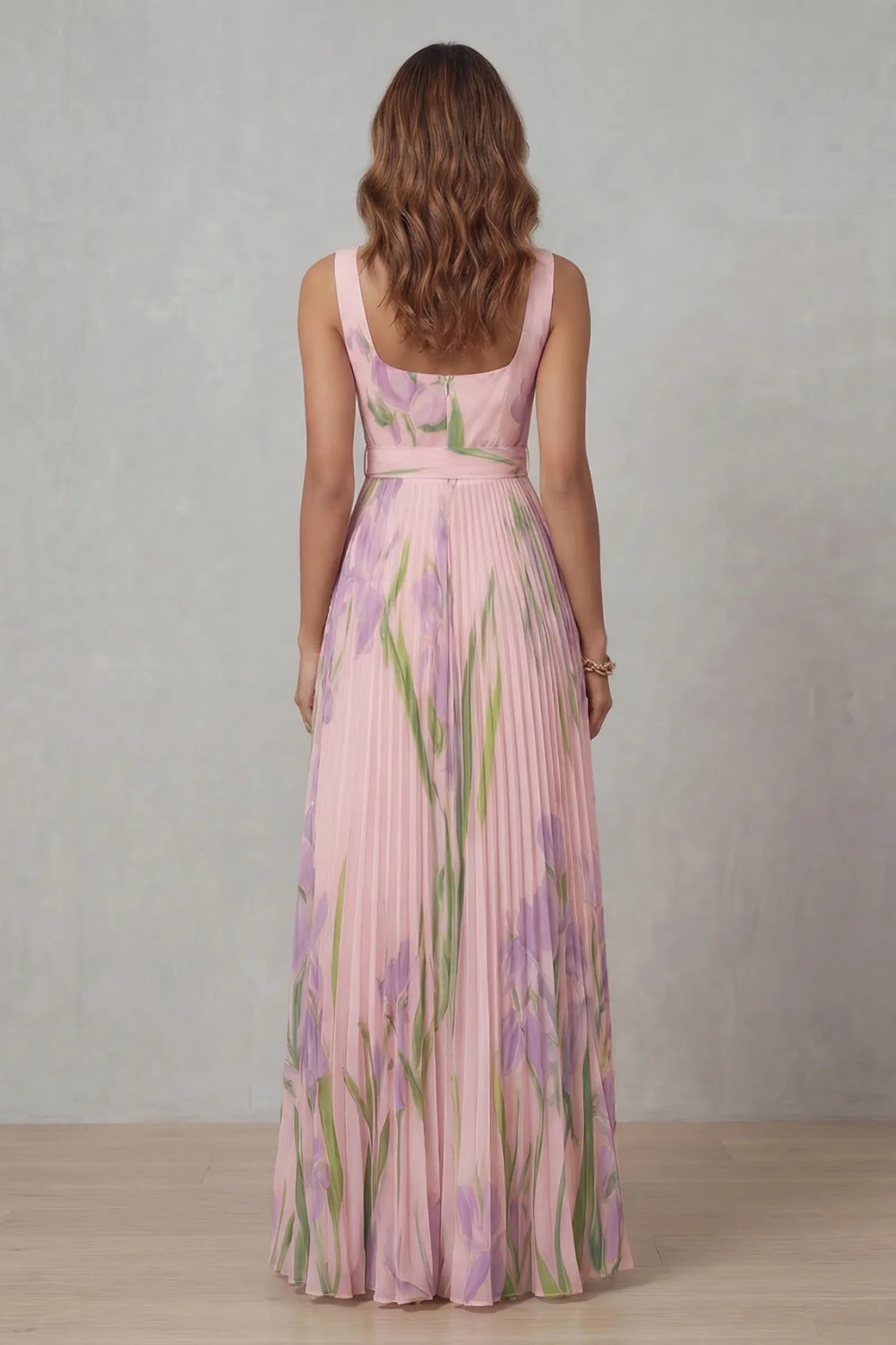 Back view: pink watercolor floral pleated maxi dress, sleeveless with elastic waist