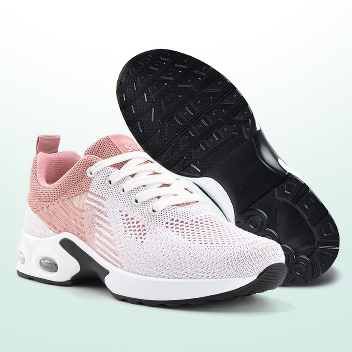 Light pink and white lightweight walking sneakers with knit upper and thick tread sole