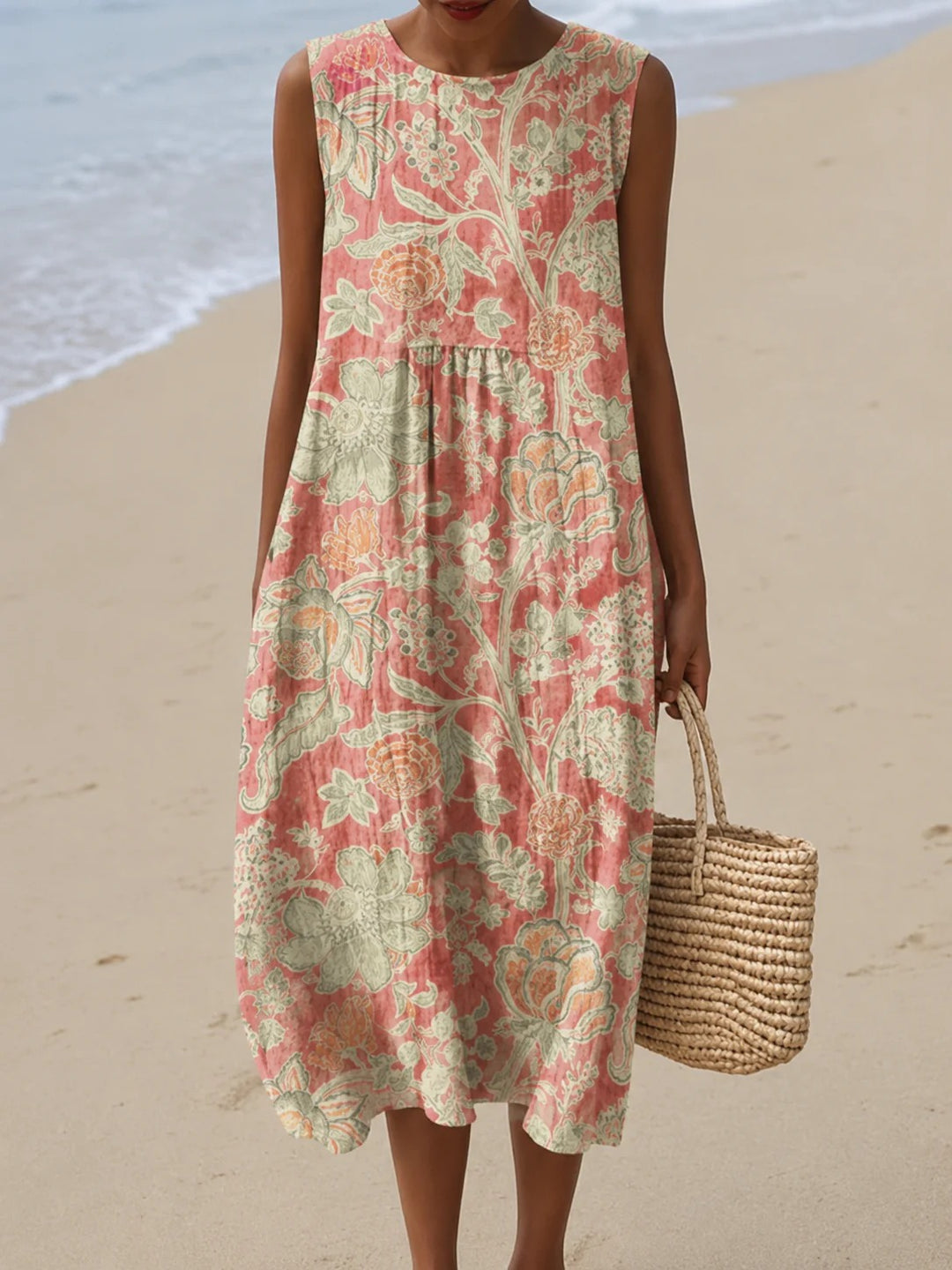 Sleeveless maxi dress, light pink and cream with abstract botanical print.