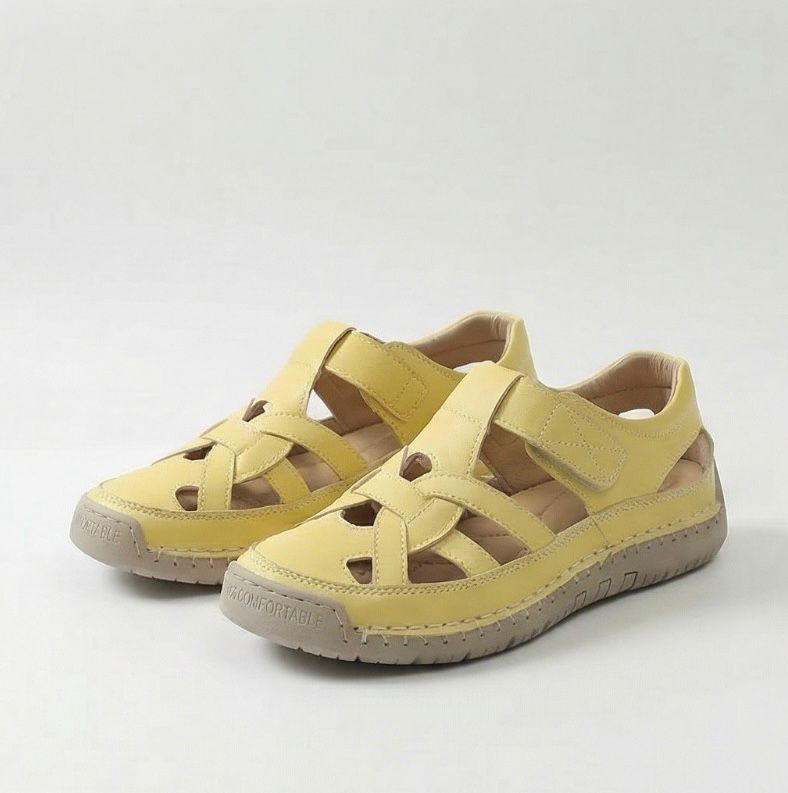 Yellow cross-strap comfort flat shoes with open toe and hook-and-loop closure
