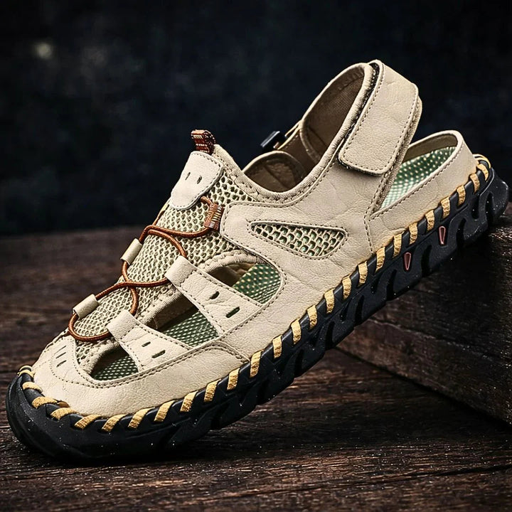 Rugged white sandals with hook-and-loop straps and green padded panels