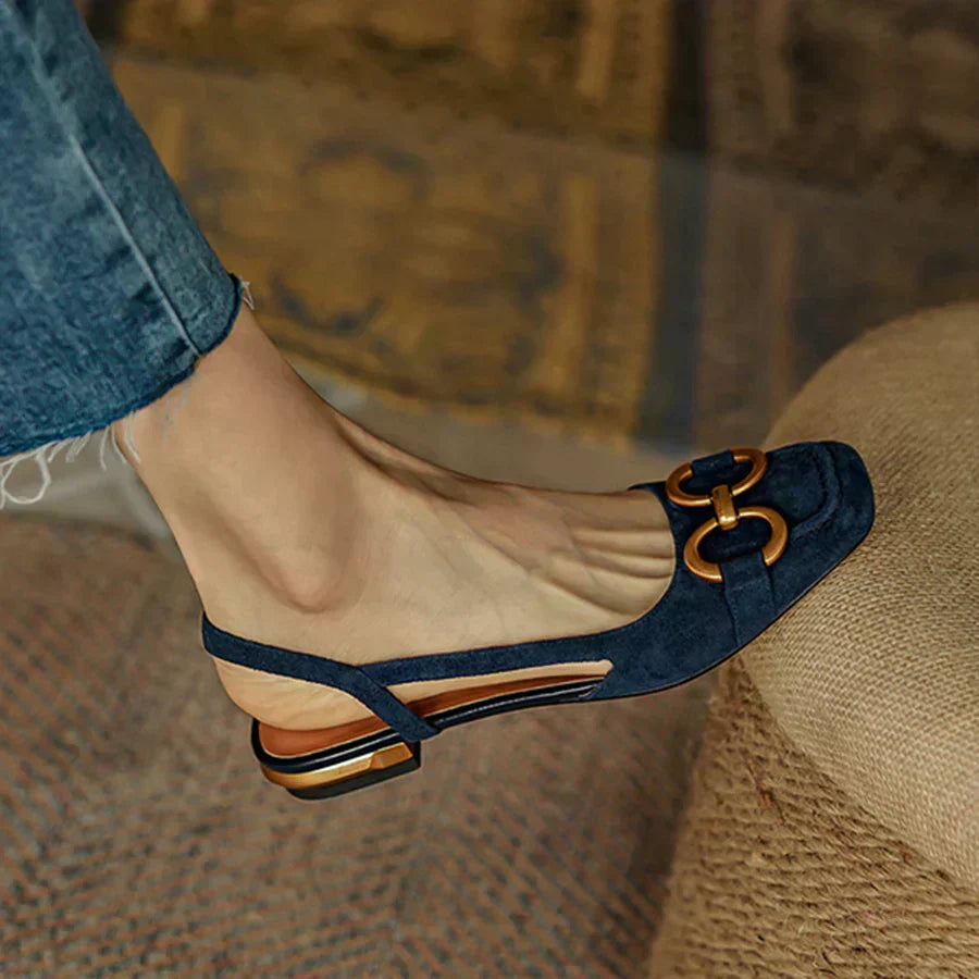Women’s buckle slingback flats in dark blue suede with gold-tone hardware and low block heel