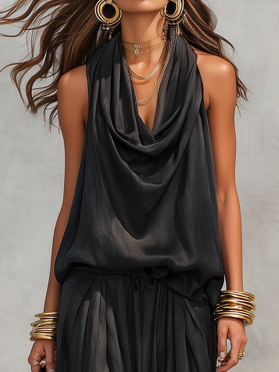 Black halter cowl-neck top with layered pleats and gathered waist, set detail