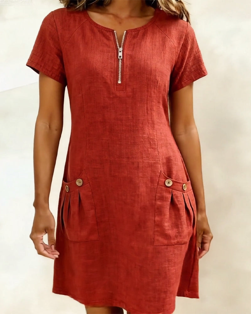 Rust red casual zip-front dress with short sleeves and two front pockets