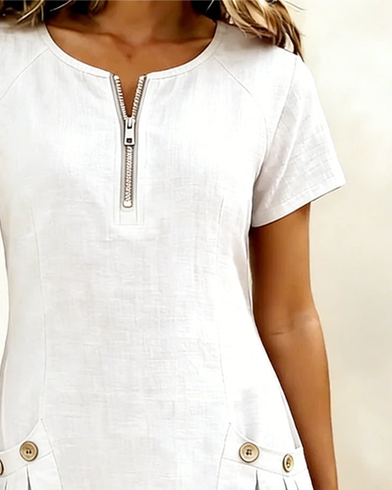 White casual zip-pocket dress close-up with front half-zip and short sleeves