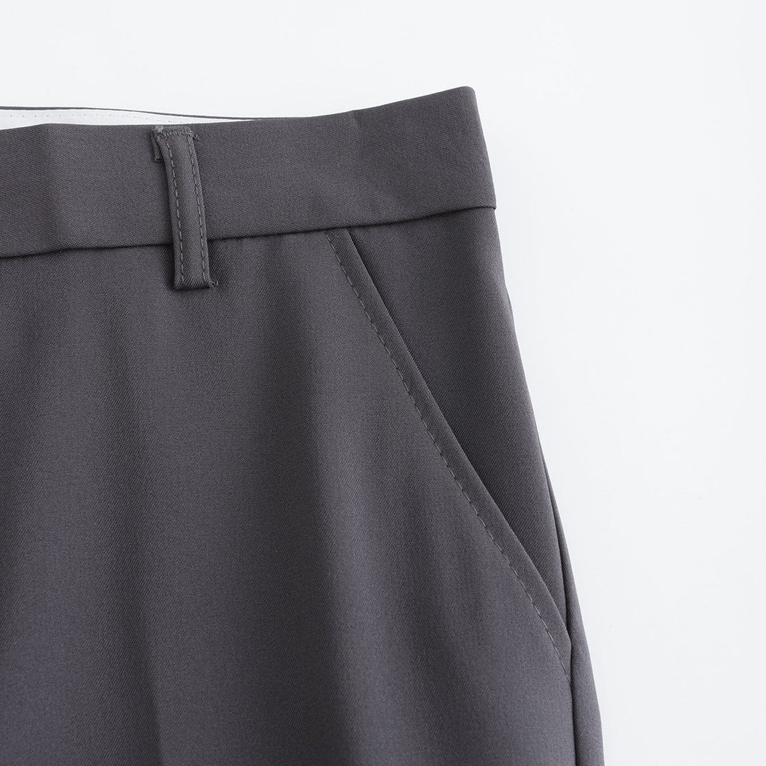 Gray stretch pants front seam detail with wide waistband and belt loop