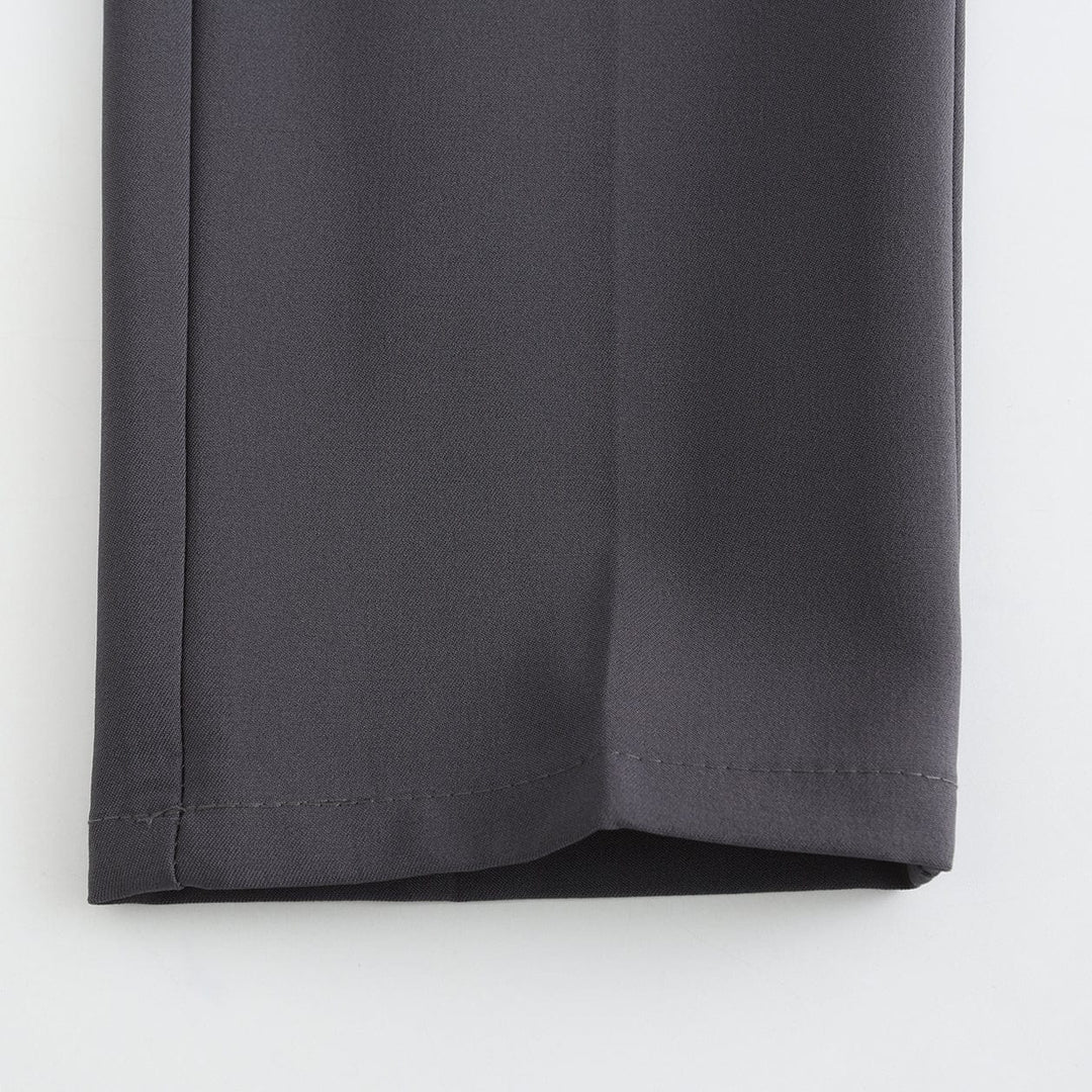 Gray stretch pant hem with stitched cuff and smooth finish