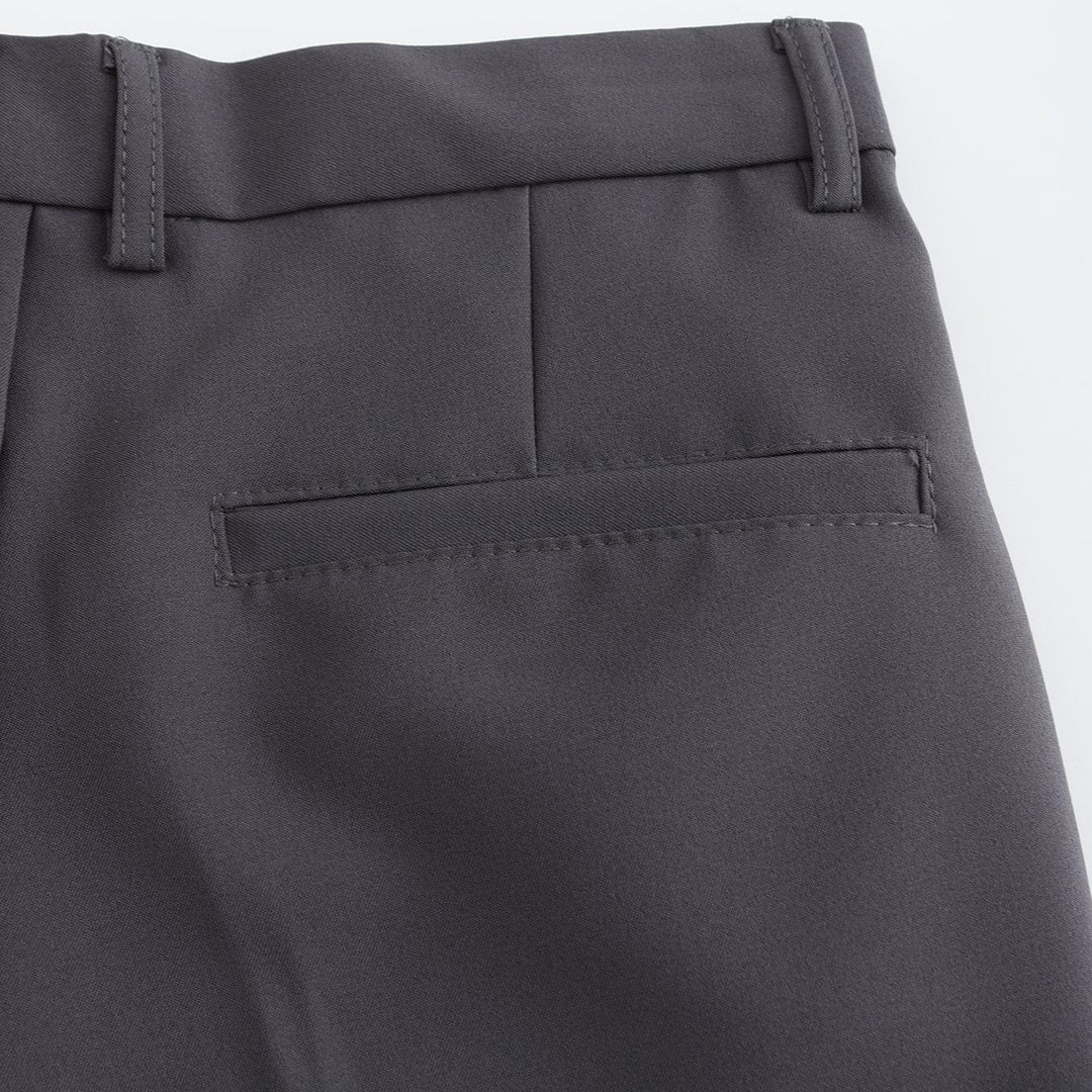 Gray stretch pants with welt pocket detail and stitched waistband edge
