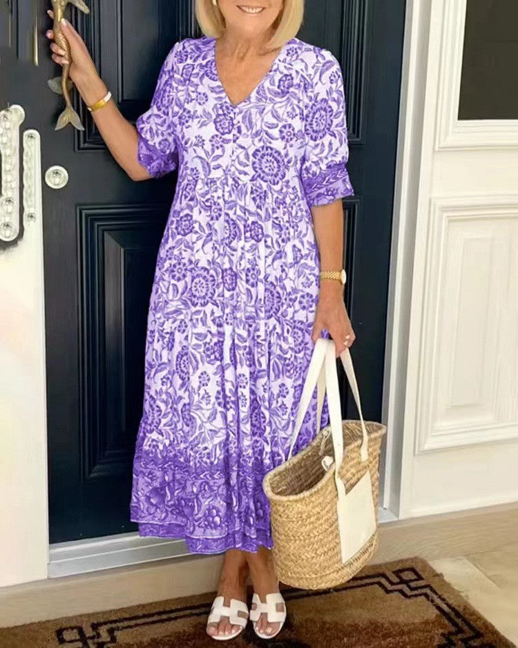 Purple floral V-neck tiered midi dress with short sleeves and ruffled layered hem