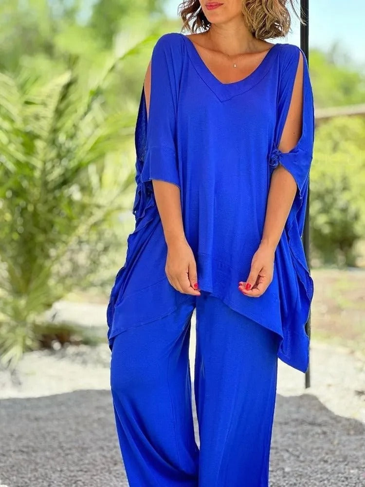 Flowing two-piece set, black V-neck tunic with loose sleeves and wide-leg pants