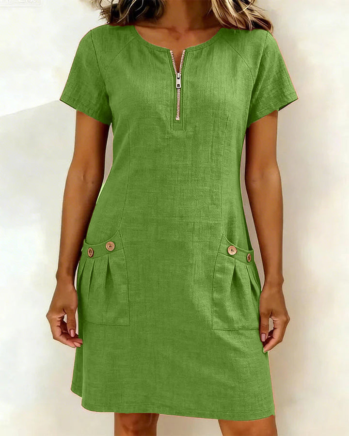Green casual zip-front dress with short sleeves and two front button pockets