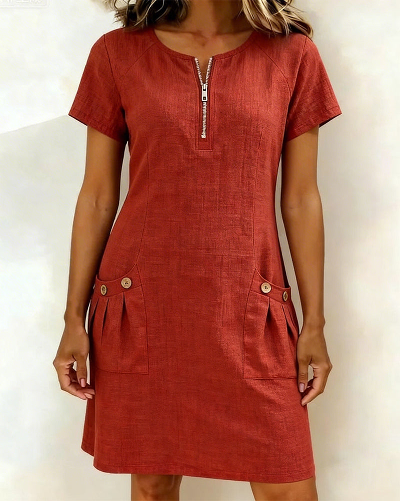 Red casual zip-front dress with short sleeves and two front pocket details