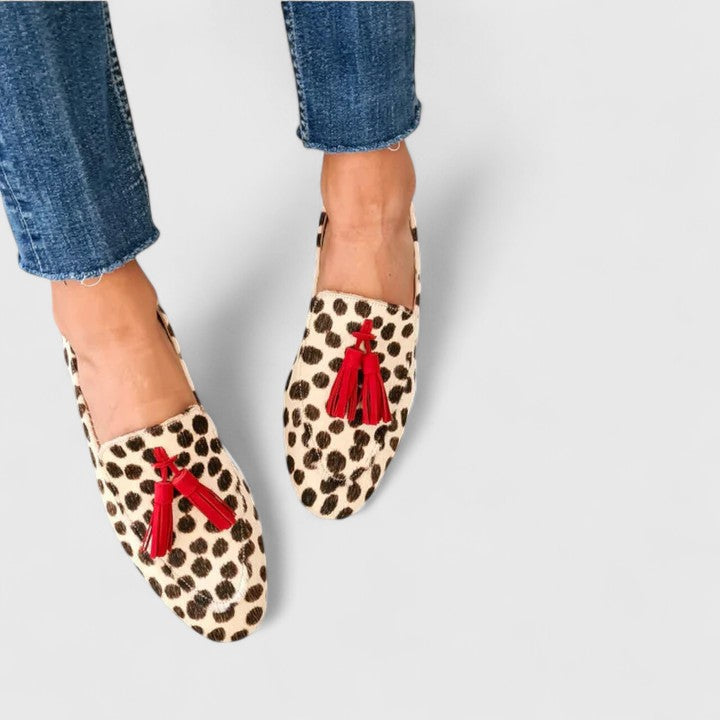 Leopard-print loafers with red tassel detail, slip-on flat shoes