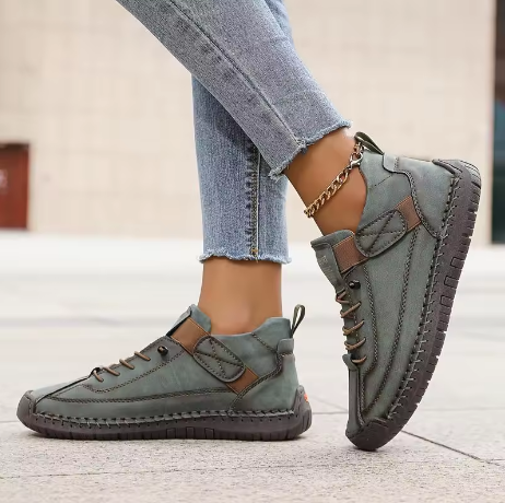 Gray orthopedic slip-on sneaker with lace-up front and hook-and-loop side panel