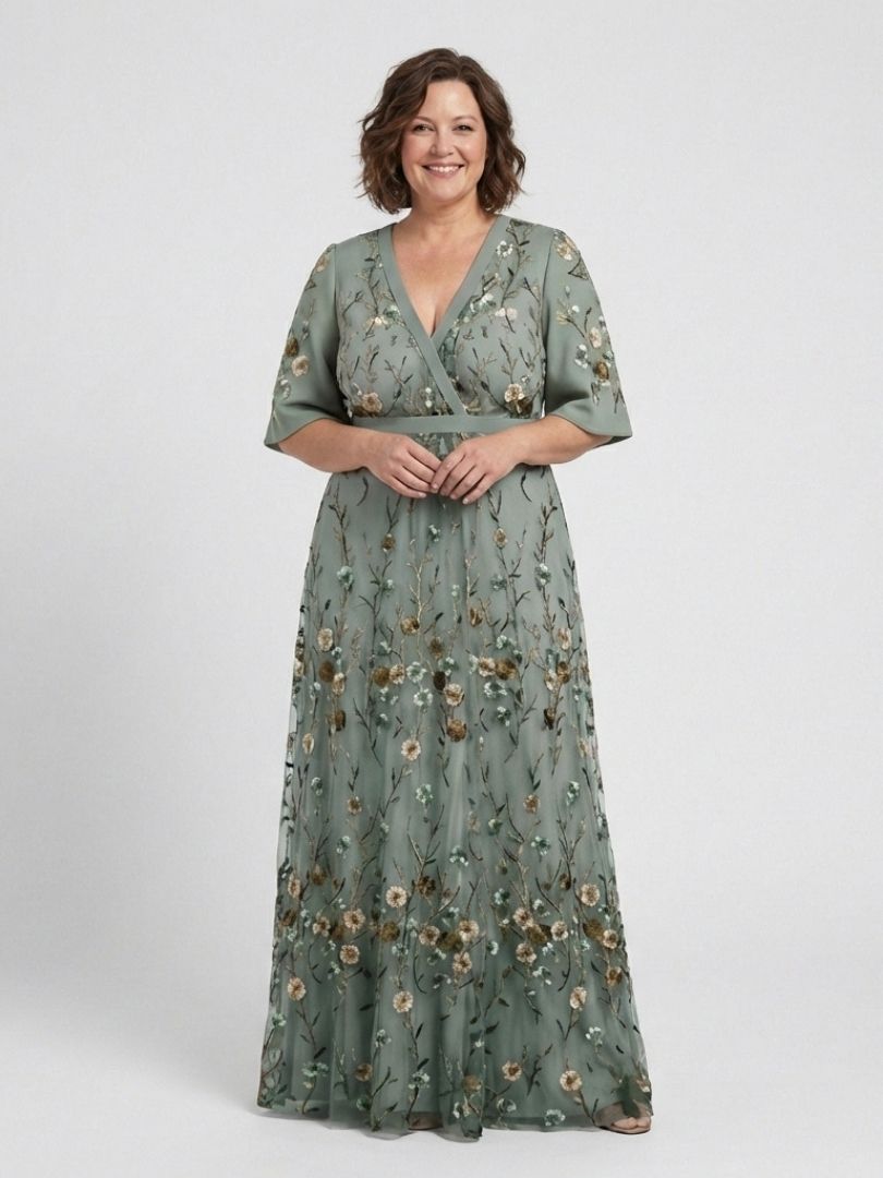 Green floral V-neck short-sleeve maxi dress with cinched waist and long flowing skirt