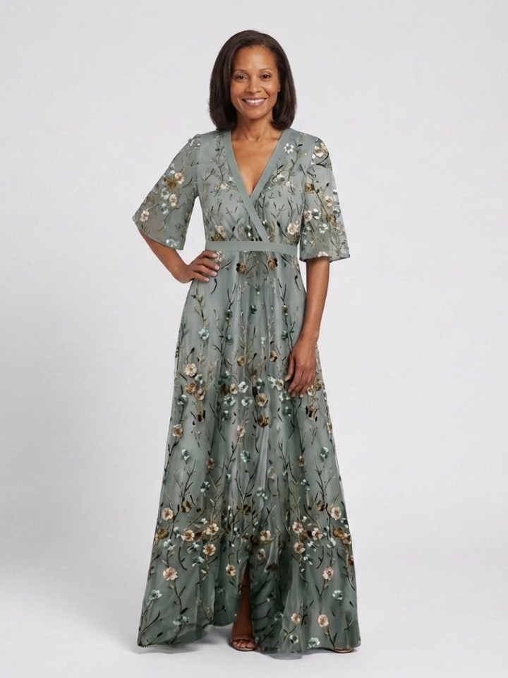 Green floral V-neck short-sleeve maxi dress with self-belt at the waist and full skirt
