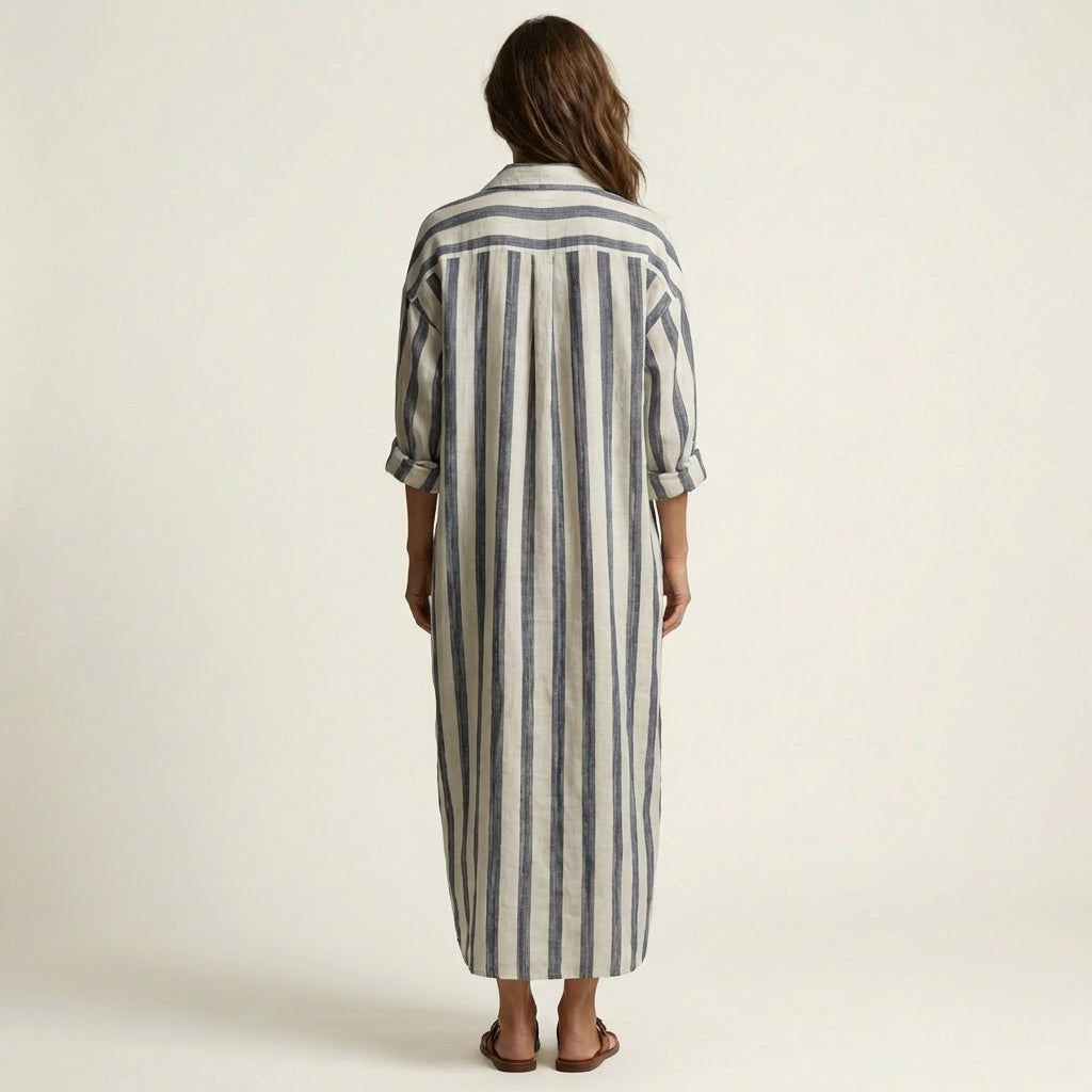 Carra striped maxi dress, back view with vertical stripes and cuffed sleeves