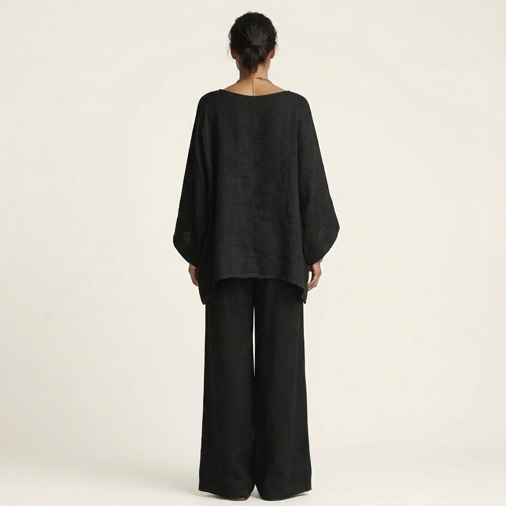 Black back view linen-blend boho set: draped dolman blouse and wide-leg pants