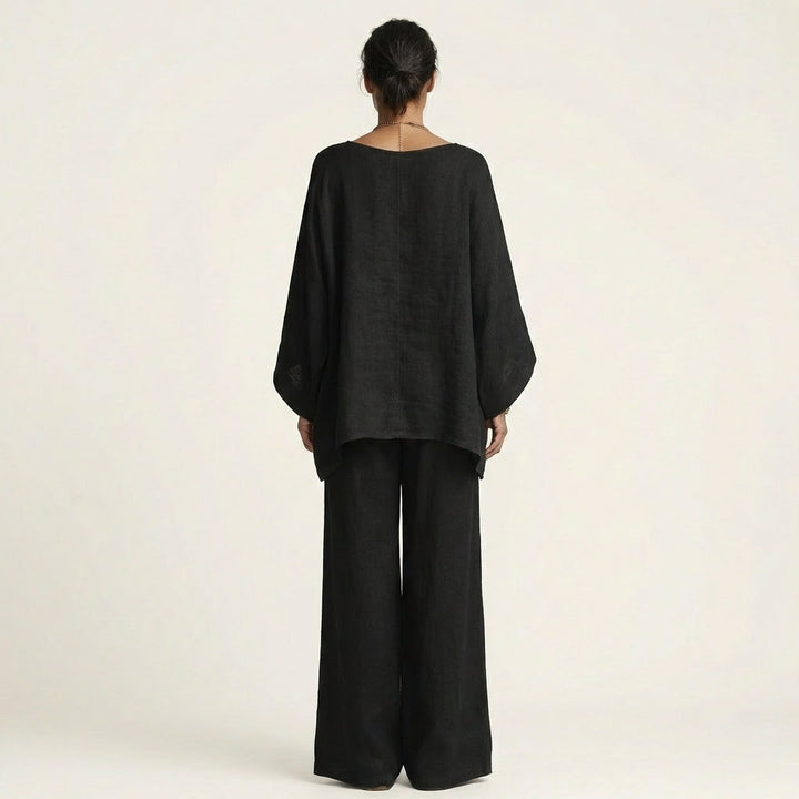 Black back view linen-blend boho set: draped dolman blouse and wide-leg pants