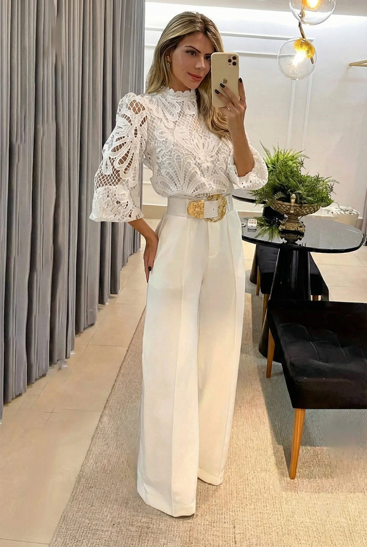 Cream lace blouse set with high-waist wide-leg trousers and gold-buckle belt