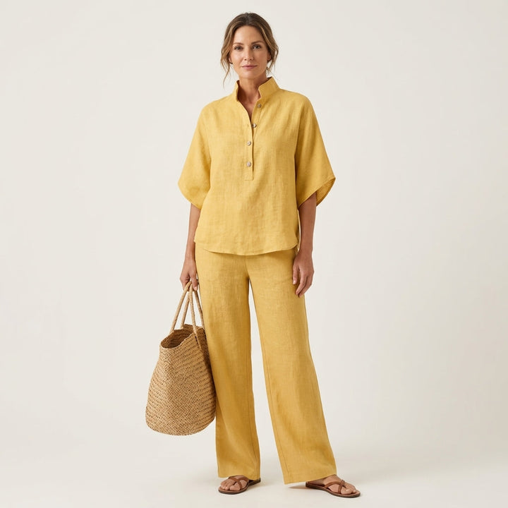 Yellow linen two-piece set with button-front blouse and wide-leg trousers