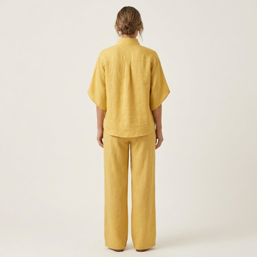 Yellow linen two-piece set, button-back blouse and wide-leg trousers