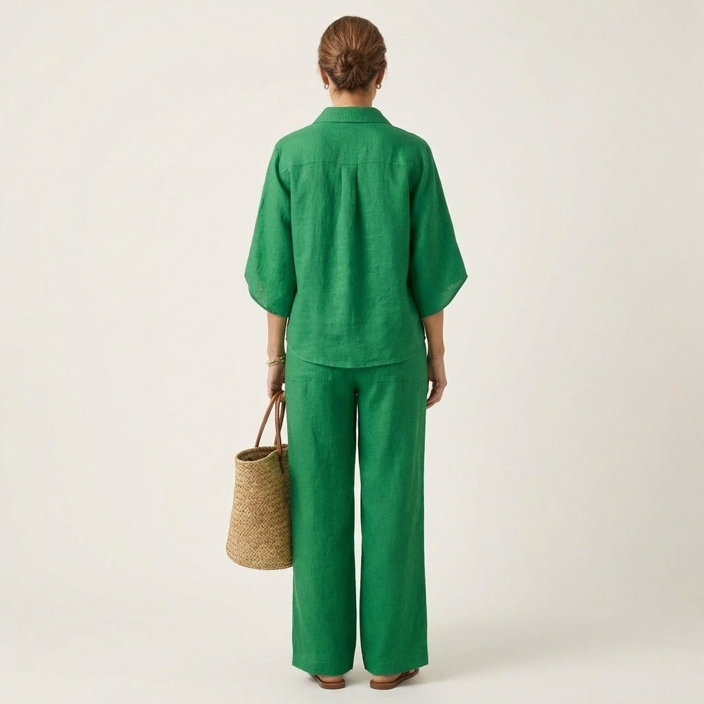 Green linen two-piece set, button-back blouse and wide-leg trousers