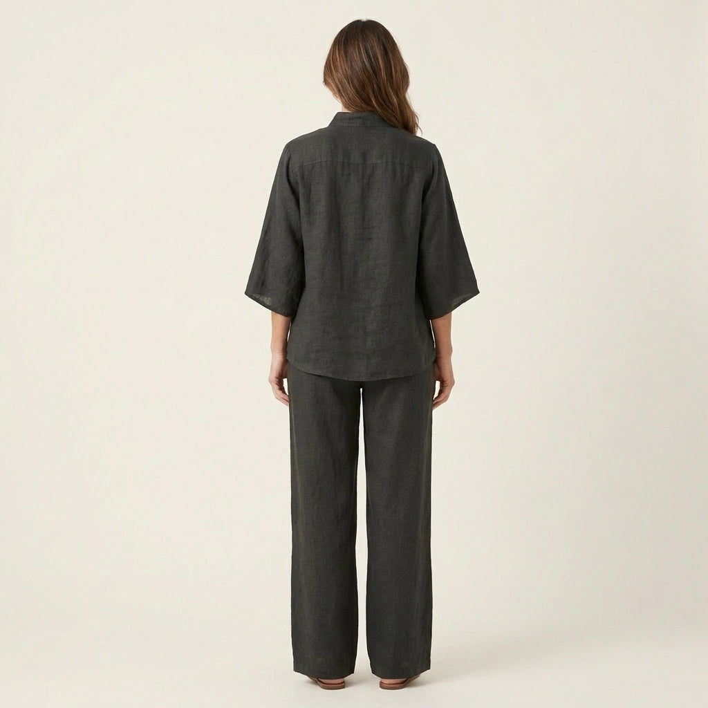 Charcoal linen two-piece set, back view of button-front blouse and wide-leg pants