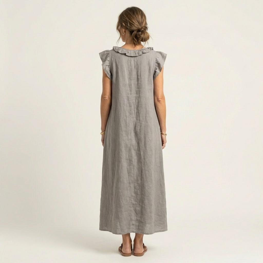 Gray linen maxi dress, back view, ruffle-trimmed yoke and cap sleeves