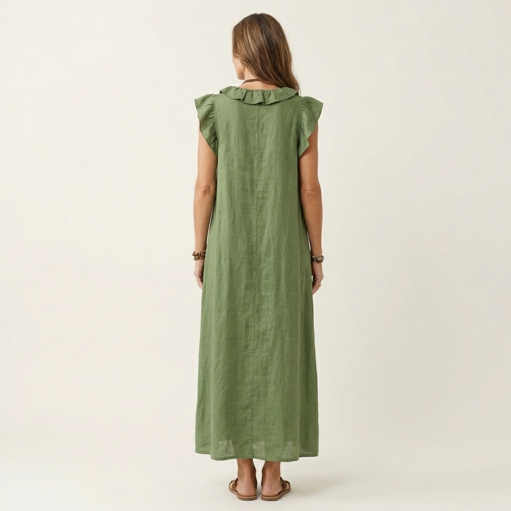 Green linen maxi dress, back view, ruffle-trimmed yoke and cap sleeves