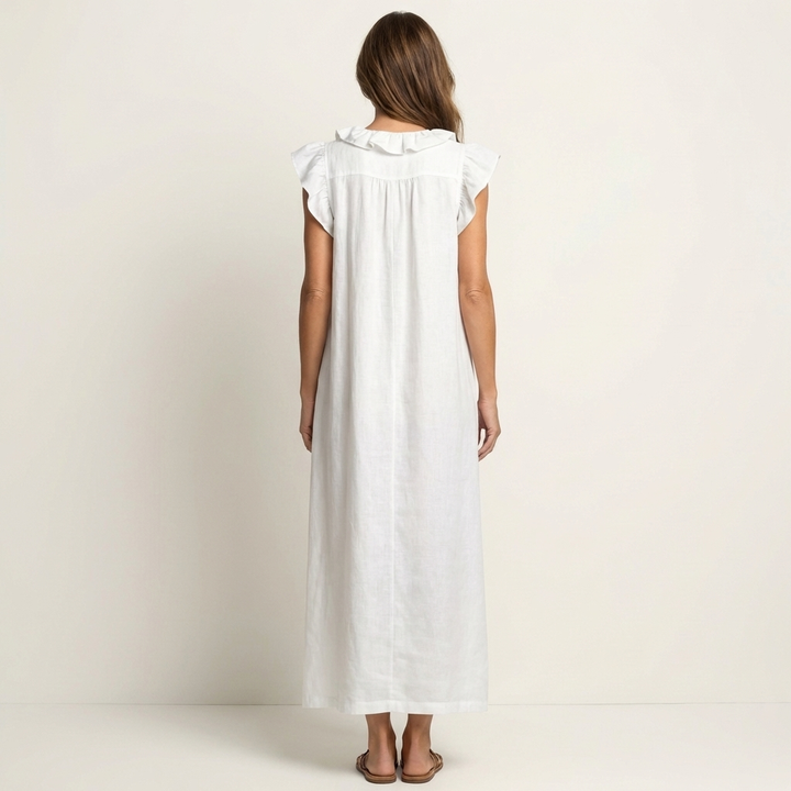 White linen maxi dress with ruffled shoulders, sleeveless, back view
