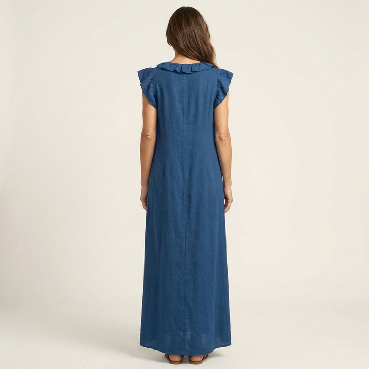 Blue linen maxi dress, back view, ruffle-trimmed yoke and cap sleeves