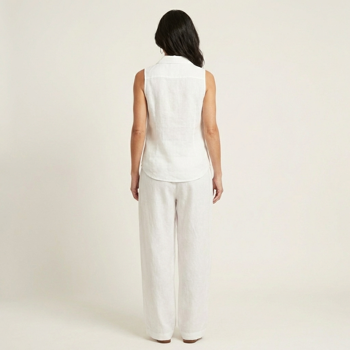 White wrap-top and wide-leg pants set, sleeveless and full-length wide legs