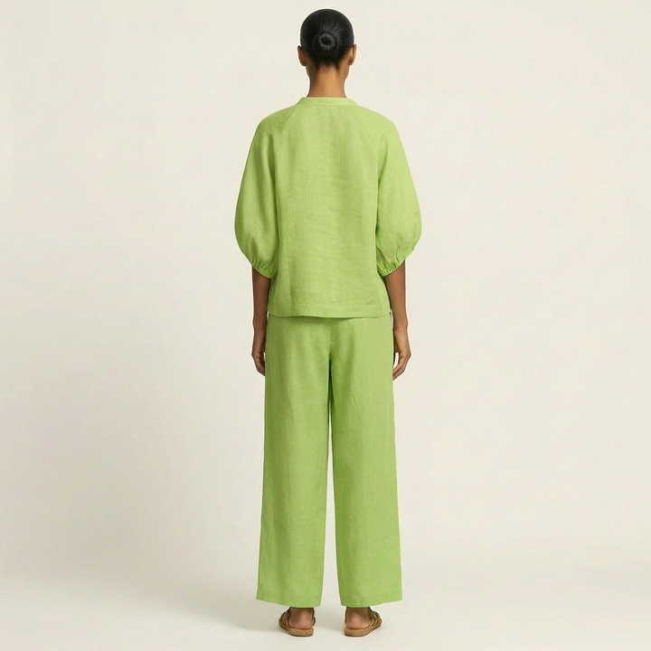 Green zipper-front puff sleeve top and wide-leg pants set, back view