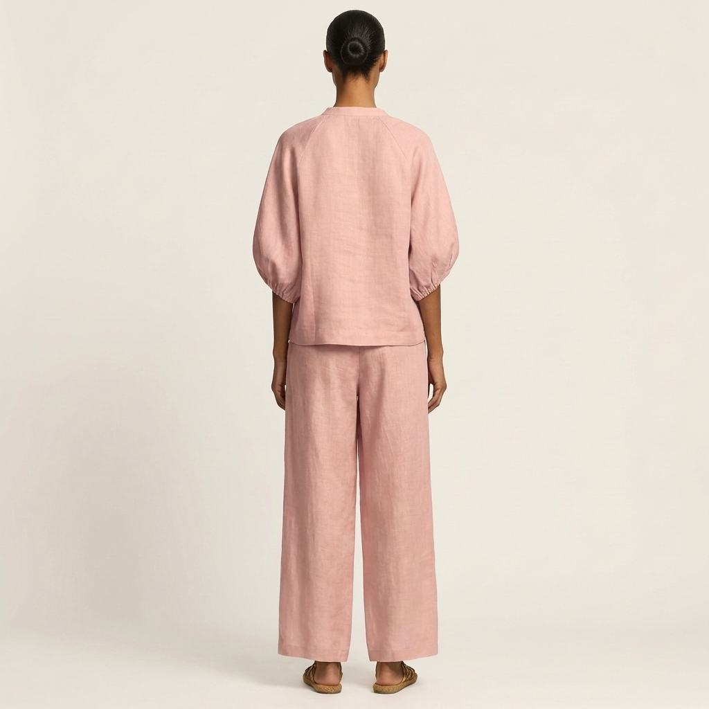 Pink zipper-front puff sleeve top and wide-leg pants set, back view