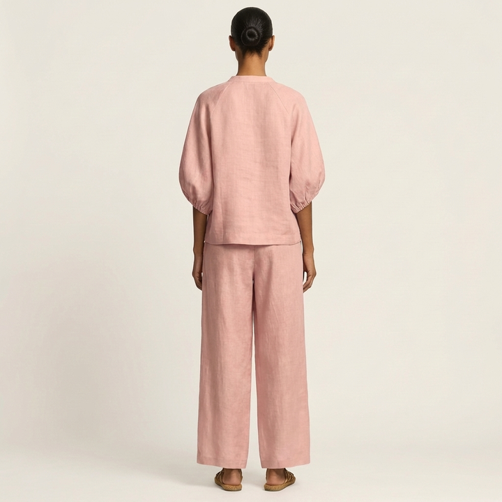 Pink zipper-front puff sleeve top and wide-leg pants set, back view