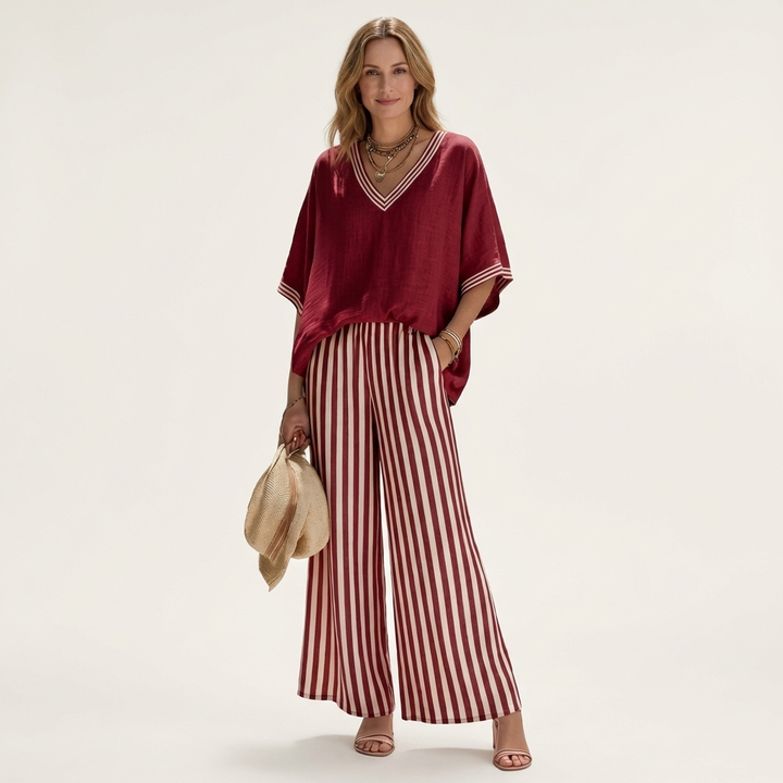 Burgundy V-neck varsity top with striped wide-leg pants in burgundy and white