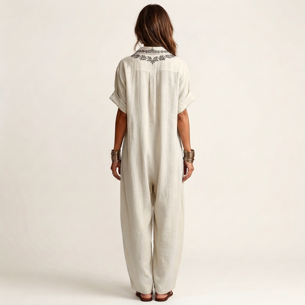 White linen maxi dress with embroidered back yoke and short sleeves