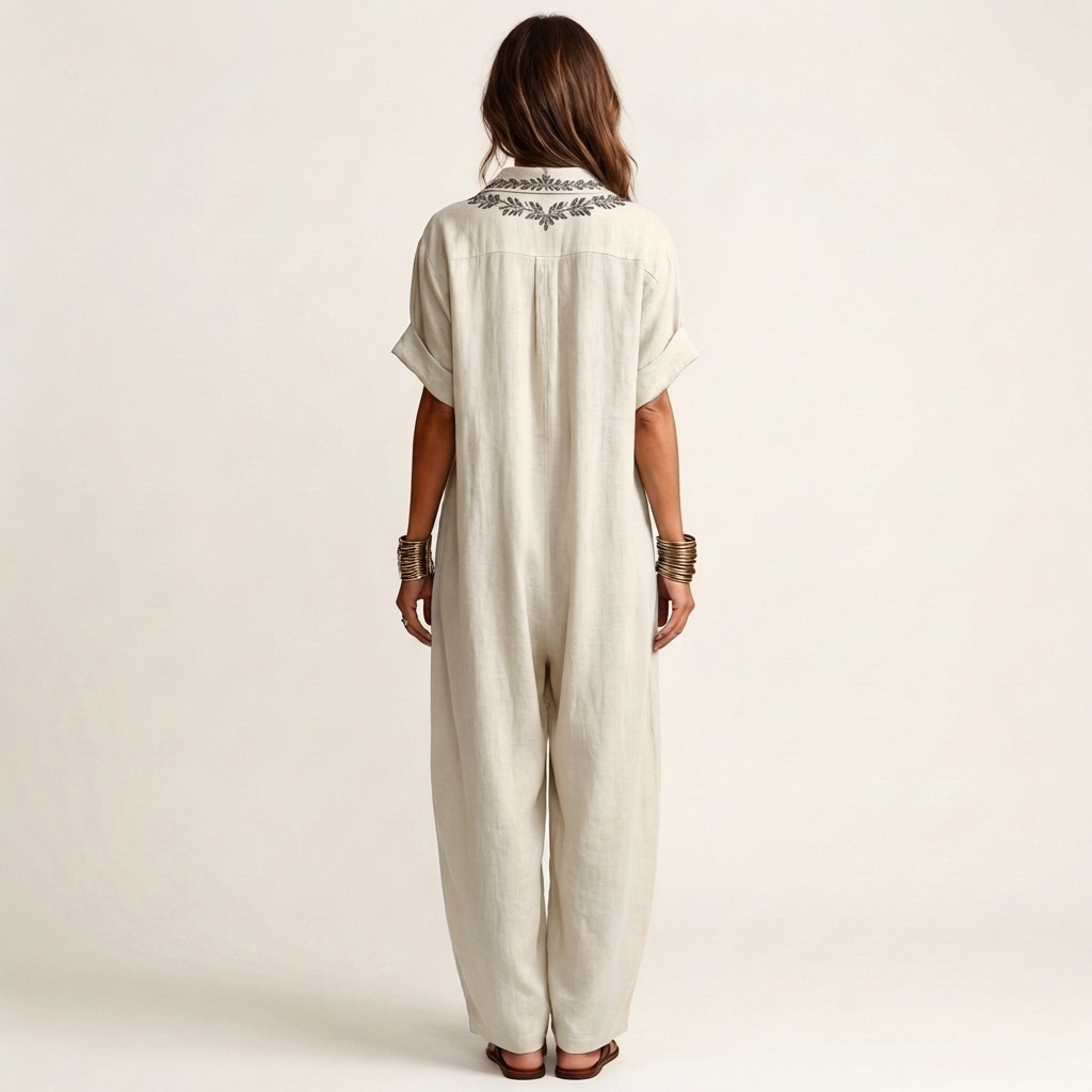 White linen maxi dress with embroidered back yoke and short sleeves