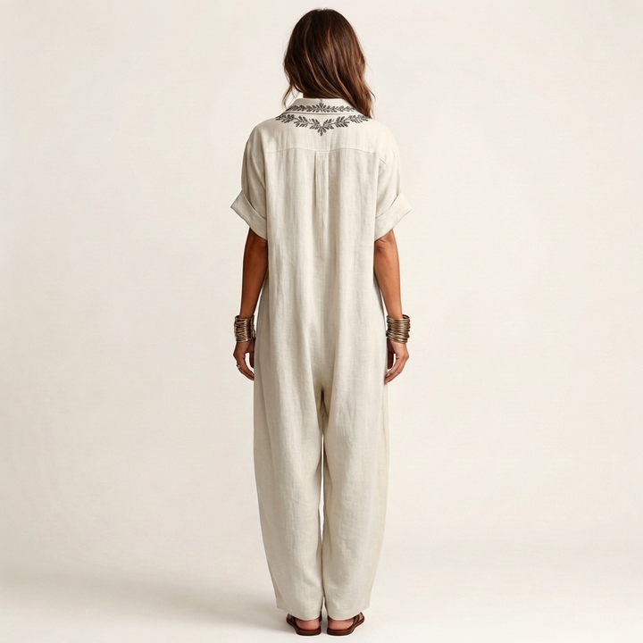White linen maxi dress with embroidered back yoke and short sleeves
