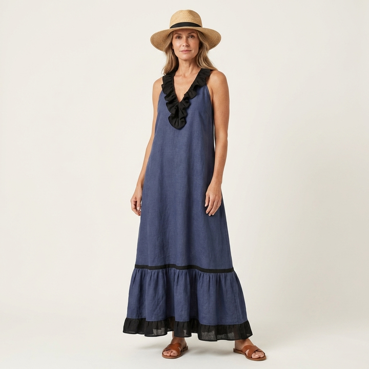 Blue sleeveless maxi dress with ruffle neckline and black contrast trim at hem