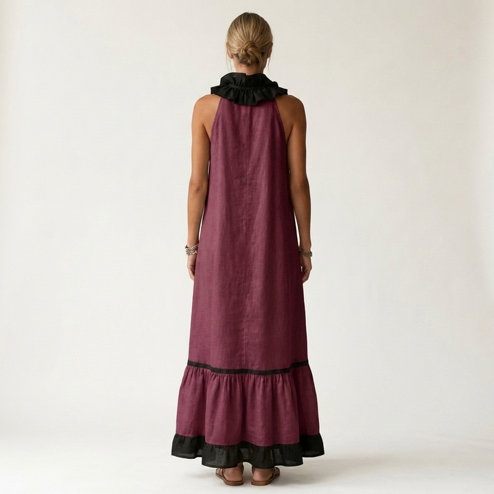 Burgundy sleeveless maxi dress, back view with ruffle neckline and black contrast hem trim