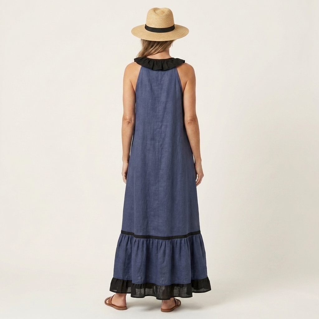 Blue sleeveless maxi dress, back view with ruffle neckline and black contrast hem trim