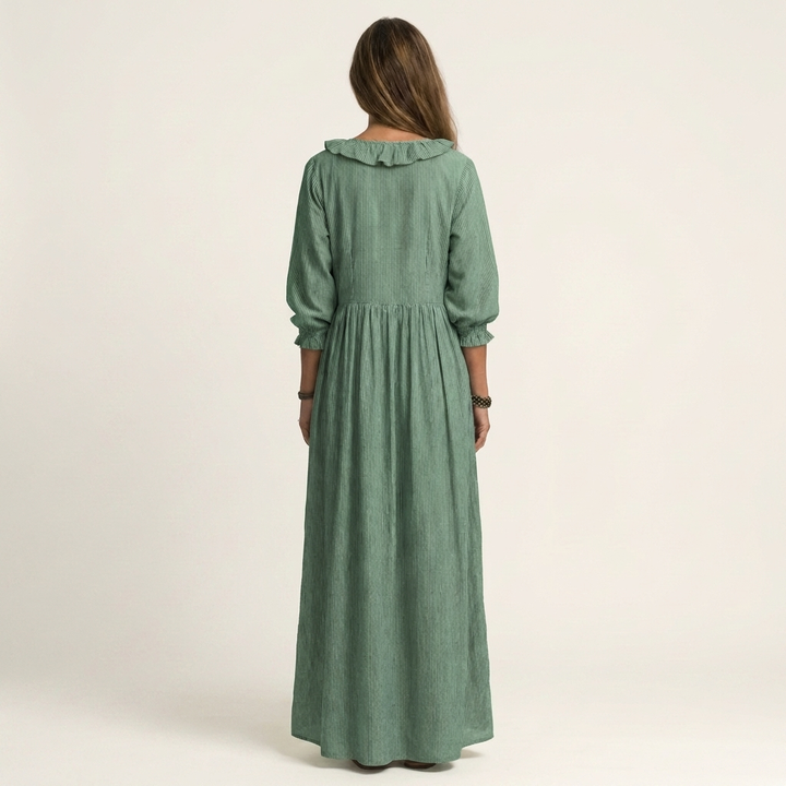 Green ruffle yoke maxi dress with gathered waist and three-quarter lantern sleeves
