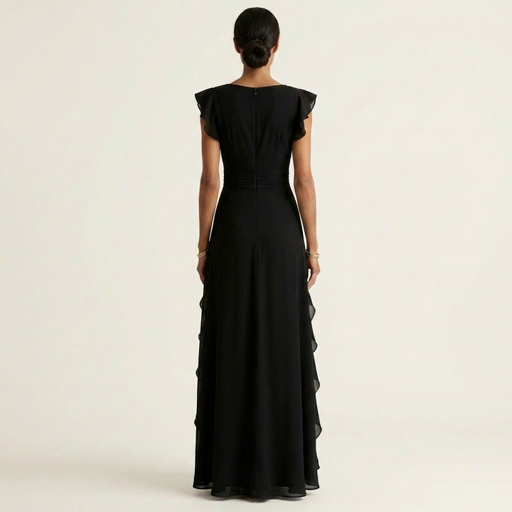Back view of black wrap-style maxi dress with flutter sleeves and cascading ruffle trim