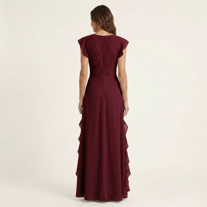 Back view of burgundy wrap-style maxi dress with flutter sleeves and ruffle accents