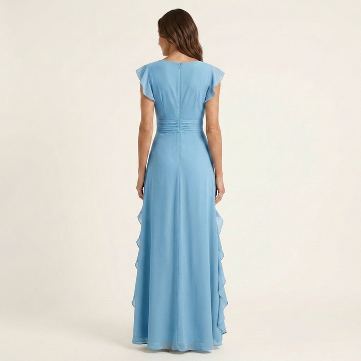 Back view of blue wrap-style maxi dress with flutter sleeves and cascading ruffle detailing