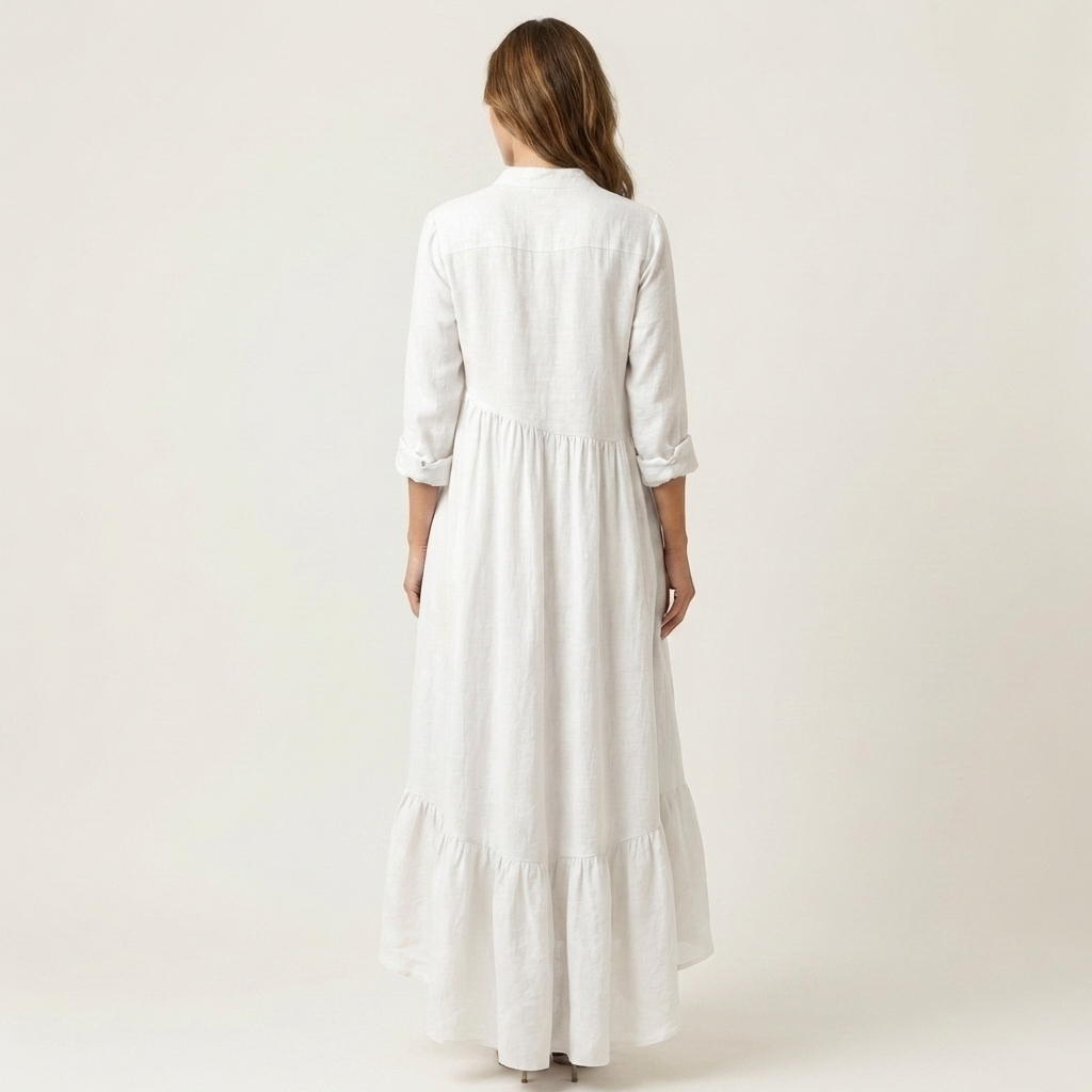 White stand-collar button-front maxi dress, back view with tiered ruffle hem