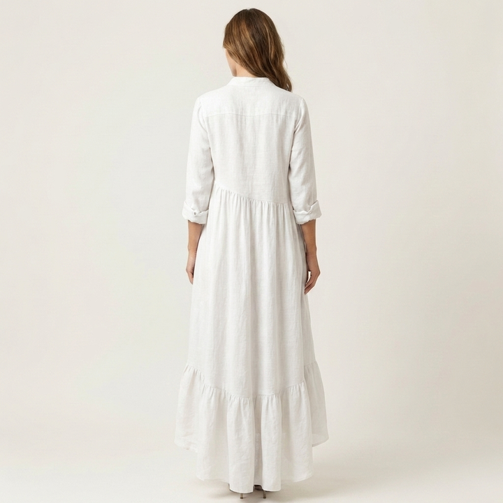 White stand-collar button-front maxi dress, back view with tiered ruffle hem